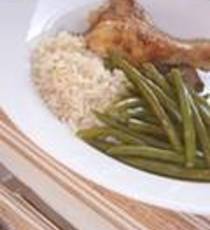 Recept: Kip in sinaasappelsaus met knoflookboontjes