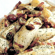 Recept: Gesmoorde witlof met buikspek en druiven