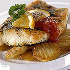 Recept: Gebakken roodbaarsfilet met sinaasappeltomatensaus