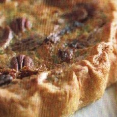 Recept: Hartige taart met brie, gedroogde tomaten en pecanoten