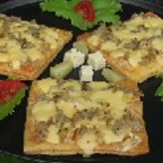 Recept: Bladerdeeg met kaas-ui mengsel