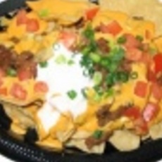 Recept: Nacho-schotel met guacamole Recept: Nacho-schotel met guacamole