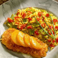 Recept: Kipschnitzel met perzik en kerrierijst Recept: Kipschnitzel met perzik en kerrierijst