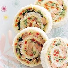 Recept: Broodrolletjes met ansjovisboter en kruiden Recept: Broodrolletjes met ansjovisboter en kruiden