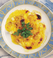 Recept: Gegratineerde garnalen met kerriesaus 