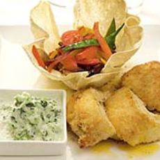 Recept: Met groenten gevulde pappadums met raita