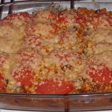 Recept: Macaroni met aubergine en courgette onder tomaten