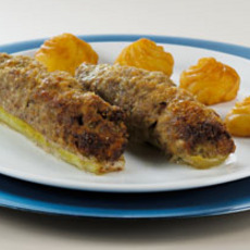 Recept: Gevulde komkommer met gehakt en geraspte kaas. 