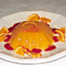 Recept: Sinaasappelpudding met aardbeiensaus Recept: Sinaasappelpudding met aardbeiensaus