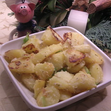 Recept: Aardappelen gewenteld in Boursin met ajuinpijpjes Recept: Aardappelen gewenteld in Boursin met ajuinpijpjes