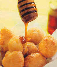 Recept: Amandelbeignets met honingsaus