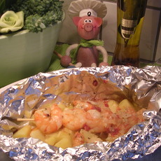 Recept: Papillote van scampi's op een spiesje Recept: Papillote van scampi's op een spiesje