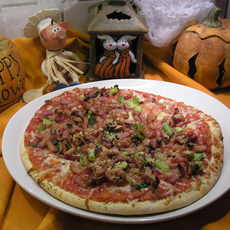Recept: Pizza met gerookt spek en gerookte kalkoen 