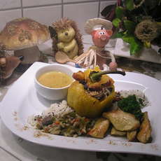 Recept: Gevulde paprika met kip, rijst en groenten