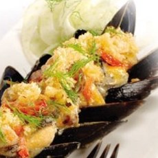 Recept: Gegratineerde mosselen met roquefort en gedroogde Recept: Gegratineerde mosselen met roquefort en gedroogde