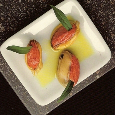 Recept: Mosselen gevuld met kreeftenboter, amandelolie en 