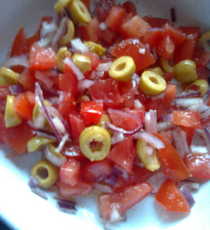 Recept: Tomatensalade met rode ui