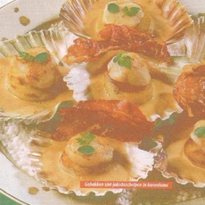 Recept: Gebakken sint-jacobsschelpen in koraalsaus