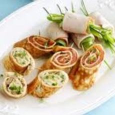 Recept: Omeletrolletjes gevuld met kruidenkaas en ham